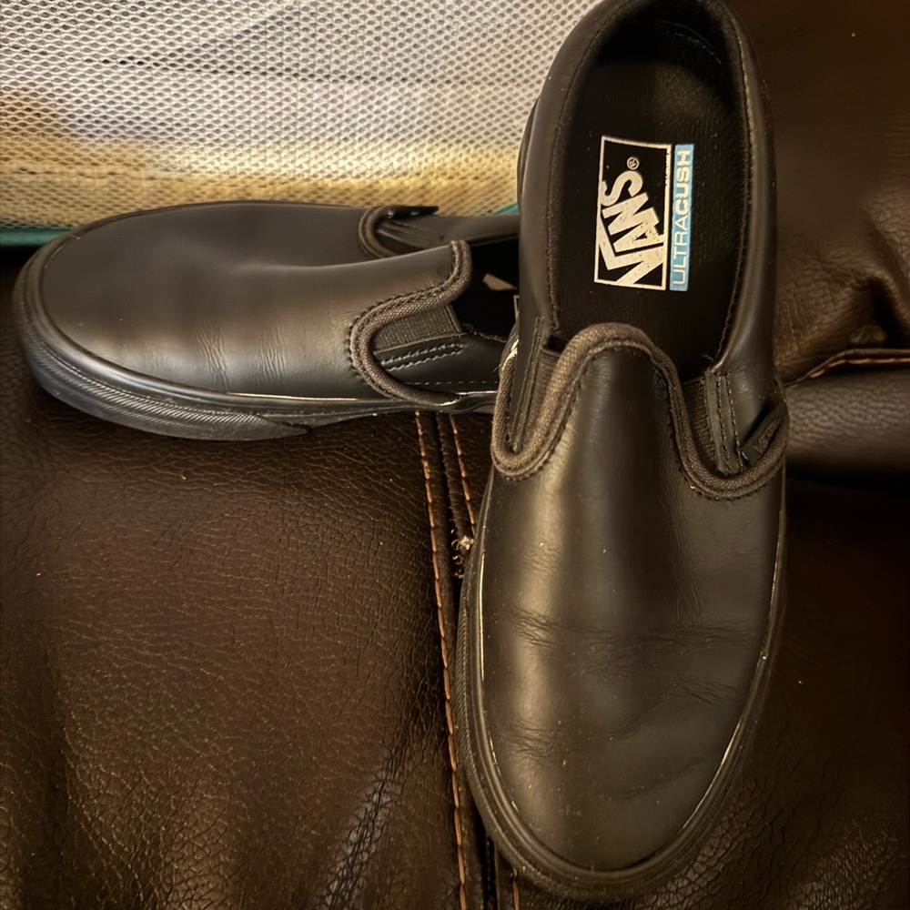Vans Black Oxfords with Leather Material and Classic Design